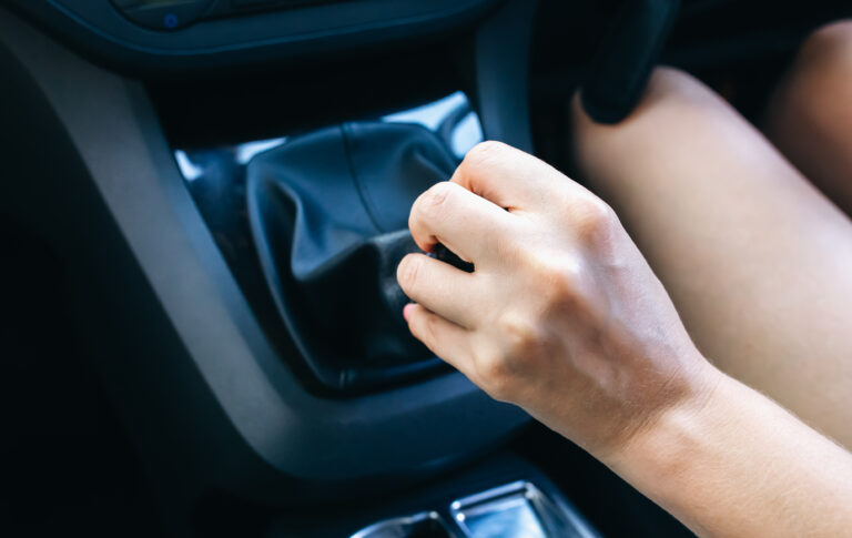 woman-is-holding-manual-gearbox-in-the-car-girl-i-2025-10-14-07-33-44-utc